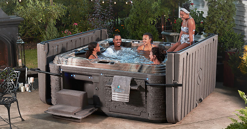 Family enjoying a Strong Spas hot tub